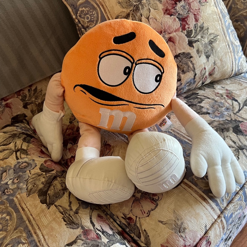 M & M plush orange doll